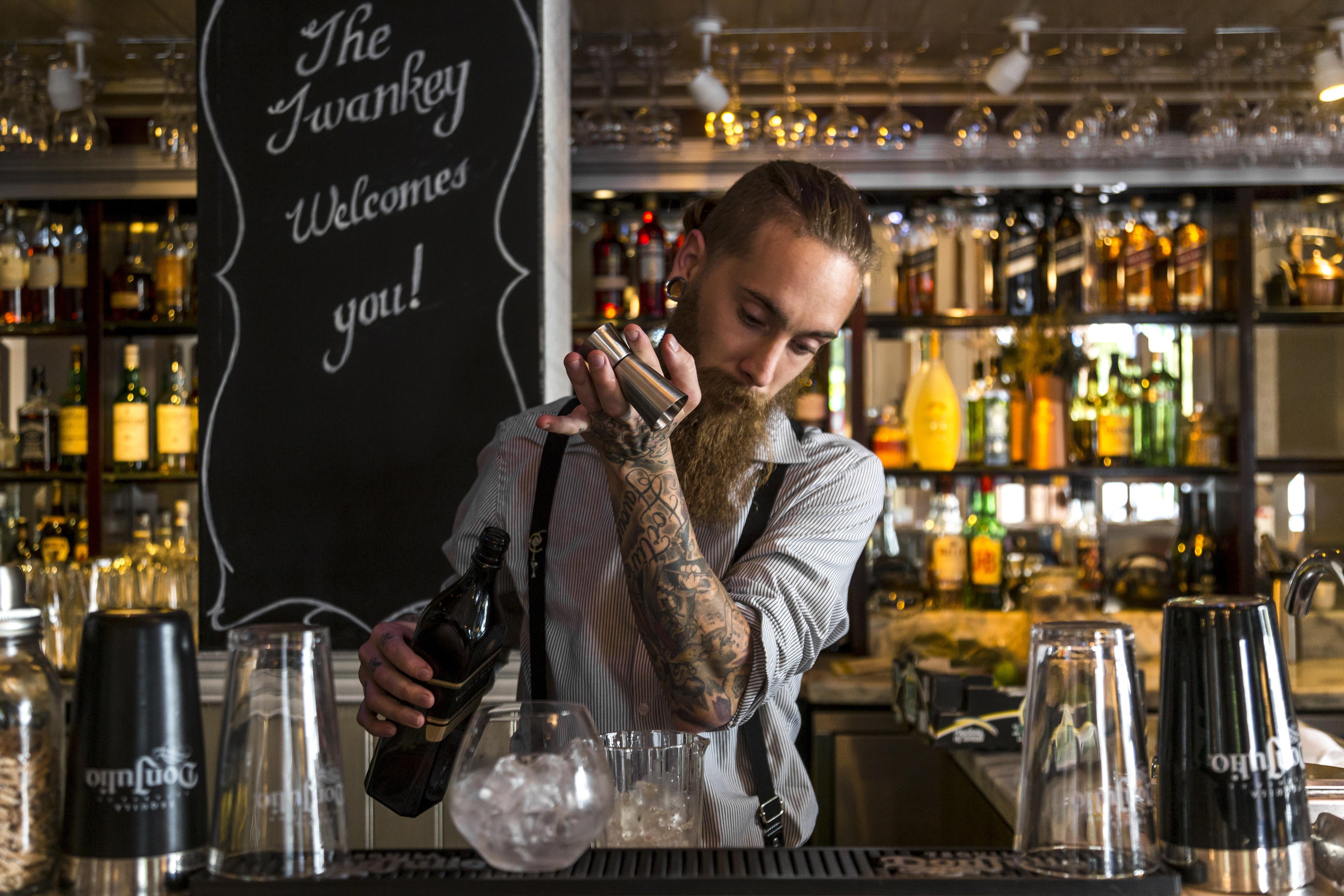 Taj Cape Town Hotel Exterior photo A bartender at work