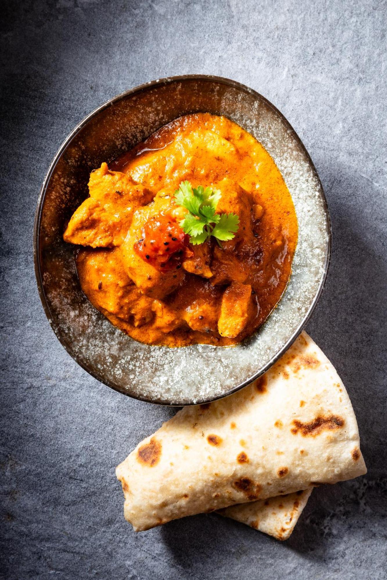 Taj Cape Town Hotel Exterior photo A plate of chicken tikka masala